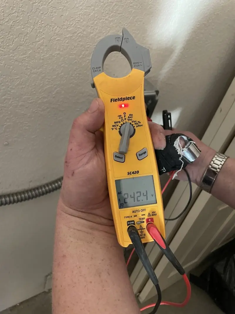 Voltage testing with clamp meter during Generator Installation in Morongo Valley